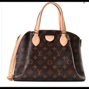 Brand new Louis Vuitton rivoli. Never used still in dust bag and shopping bag.